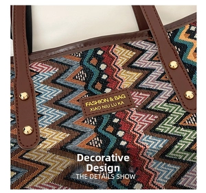 Detail of colorful geometric woven pattern with brown leather handle and gold rivets