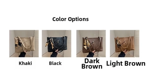 Detail view of large tote bags in khaki, black and brown with decorative scarves