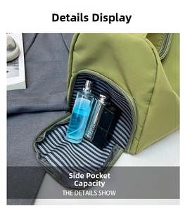 Detail view of the green nylon bag side pocket showing large storage for cosmetics