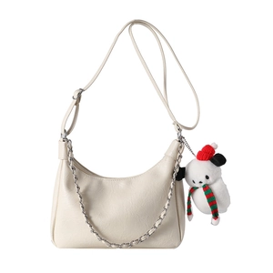 Large cream pleated tote bag with silver chain and festive Snoopy plush charm