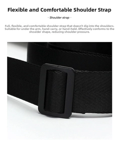Close-up of black adjustable shoulder strap with durable woven nylon texture and buckle
