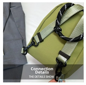 Macro detail of green nylon bag showing climbing rope strap and plastic buckle