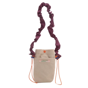 Corduroy crossbody bag for women with purple ruffled strap and orange accents