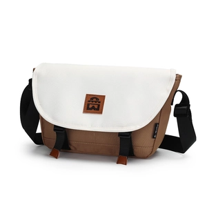 Contrast color canvas messenger bag with adjustable strap and buckle closure