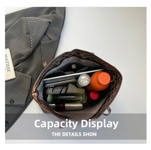 Interior view of tote bag showing large capacity for tablet and cosmetics