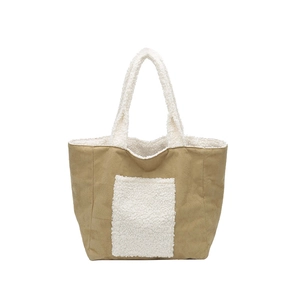 Khaki suede tote bag with white fleece trim and sheepskin pocket for autumn and winter