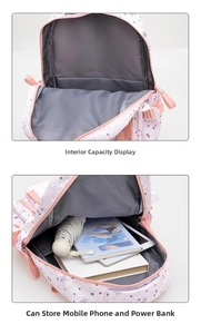 Detailed view of spacious interior storage for school backpack with pink star pattern