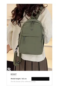 Olive green multifunctional nylon backpack shown on a 165cm model for size reference