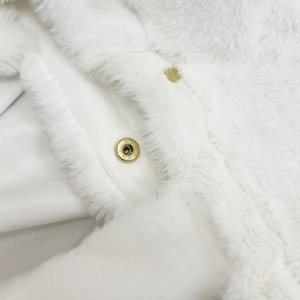 White faux fur tote bag with soft texture and premium gold metal snap fastener detail
