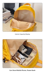 Detail view of the spacious inner compartment showing phone and umbrella storage
