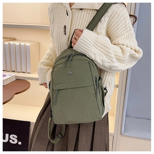 Army green nylon backpack with multiple zipper compartments and durable strap detail