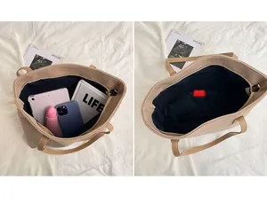 Interior view of khaki corduroy tote bag showing large main compartment with dark lining