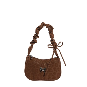 Brown leopard print hobo bag with silver butterfly buckle and pleated shoulder strap
