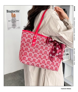Detail of red wedding tote bag featuring traditional Double Happiness pattern and silk scarf