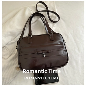 Size comparison showing smartphone inside large coffee PU leather bowling bag