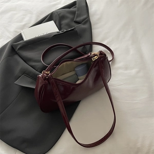 Classic burgundy glossy leather underarm bag for women with minimalist retro french style
