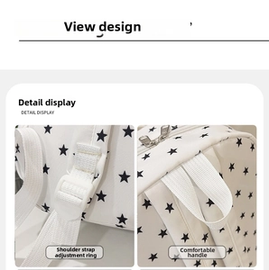 Detail of adjustable shoulder straps and top handle on star pattern backpack