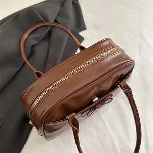 Borsa a spalla marrone vintage in pelle con fiocco e doppi manici per il pendolarismo