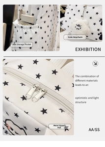 Detail view of star print backpack featuring side pockets and cute plush charm accessory