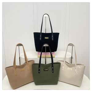 Detailed corduroy texture and metal rivet accents on various colored tote bags