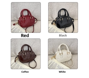 Detail of mini oil leather handbags in four colors with embossed logo and thin straps