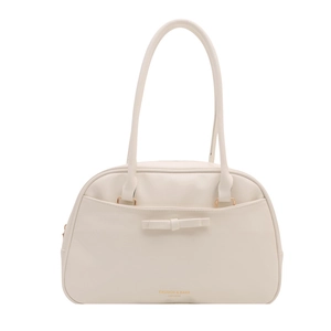 Minimalist white leather underarm bag with bow detail and semi-circular pillow shape design