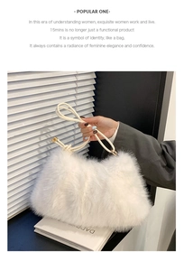 Detail of white plush tote bag featuring fluffy faux fur texture and gold buckle straps