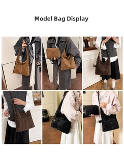 Detail view of large vintage leather tote bags in brown and black with contrast stitching