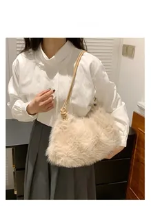 Detail view of the beige plush shoulder bag featuring soft faux fur and leather straps