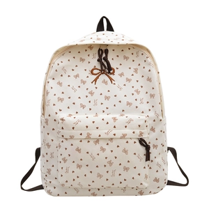 Schulrucksack aus Cord in Beige mit braunen Schleifen- und Herzmustern für Damen