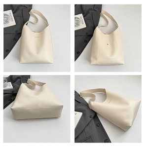 Vues détaillées du sac cabas crème montrant sa texture lisse et son fermoir magnétique