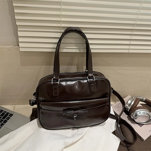 Women PU Leather Boston Handbag With Bowknot Heart Pendant Retro Academic Style Versatile Shoulder Crossbody Bag