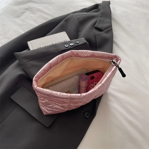 Pink quilted travel makeup bag with large capacity, puffy cloud style for toiletries