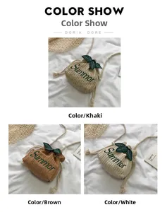 Three colors of straw bucket bags with green leaf trim and Summer embroidery detail