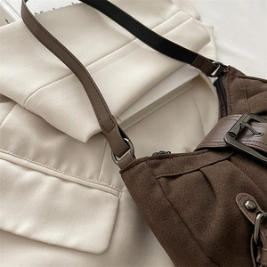 Retro brown suede shoulder bag with vintage metal buckle and leather strap for women
