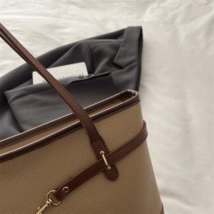 Chic beige and brown pebbled faux leather tote bag with gold hardware for office use