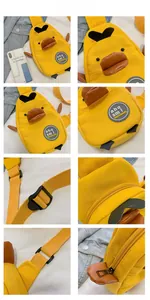 Detail view of the cute yellow duck canvas chest bag showing zipper and adjustable strap