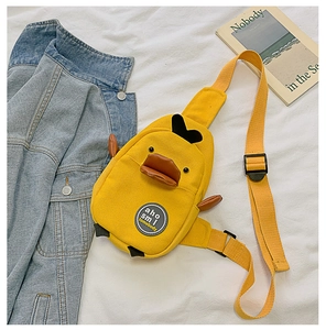 Detailed close-up of a yellow duck canvas chest bag with adjustable strap and wings