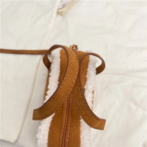 Vintage brown suede and shearling tote bag with zipper closure for autumn winter style