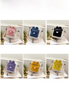 Detail of canvas drawstring bucket bags in six colors with cute bunny ear front pockets
