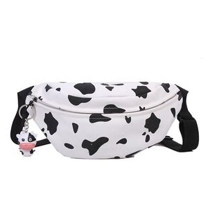 Cute cow print canvas waist bag with adjustable strap and small plush cow keychain