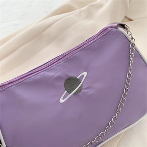 Purple nylon baguette bag with planet embroidery and silver chain shoulder strap