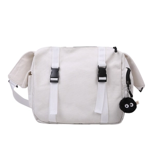 White large capacity canvas messenger bag with adjustable strap and plush pendant