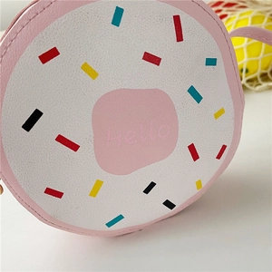 Close-up of donut-inspired girl crossbody bag with colorful sprinkles and hello print