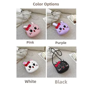 Detail view of mini rabbit crossbody bags in pink, purple, white and black colors