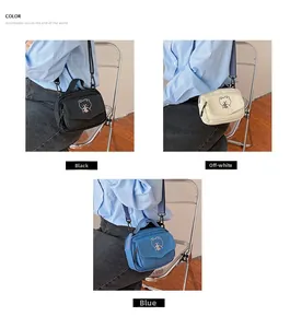Three colors of canvas messenger bags with cute bear embroidery and adjustable straps