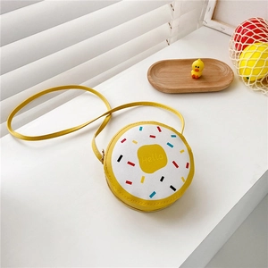 Detail of donut-shaped girls' crossbody bag with Hello print and colorful sprinkles design