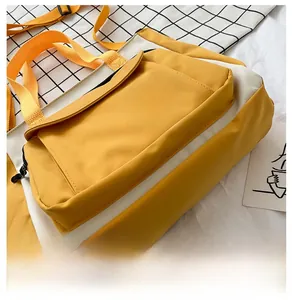 Detail view showing durable yellow oxford fabric stitching and bottom design of the bag