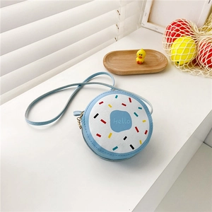 Detail of round light blue doughnut crossbody bag for girls with Hello print