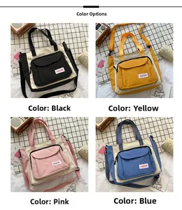 Detail view of four-color oxford cloth tote bags with large pockets and fashion labels
